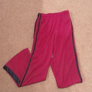 Pink Nike athletic pants with dark navy stripe.  Girls M 10-12.